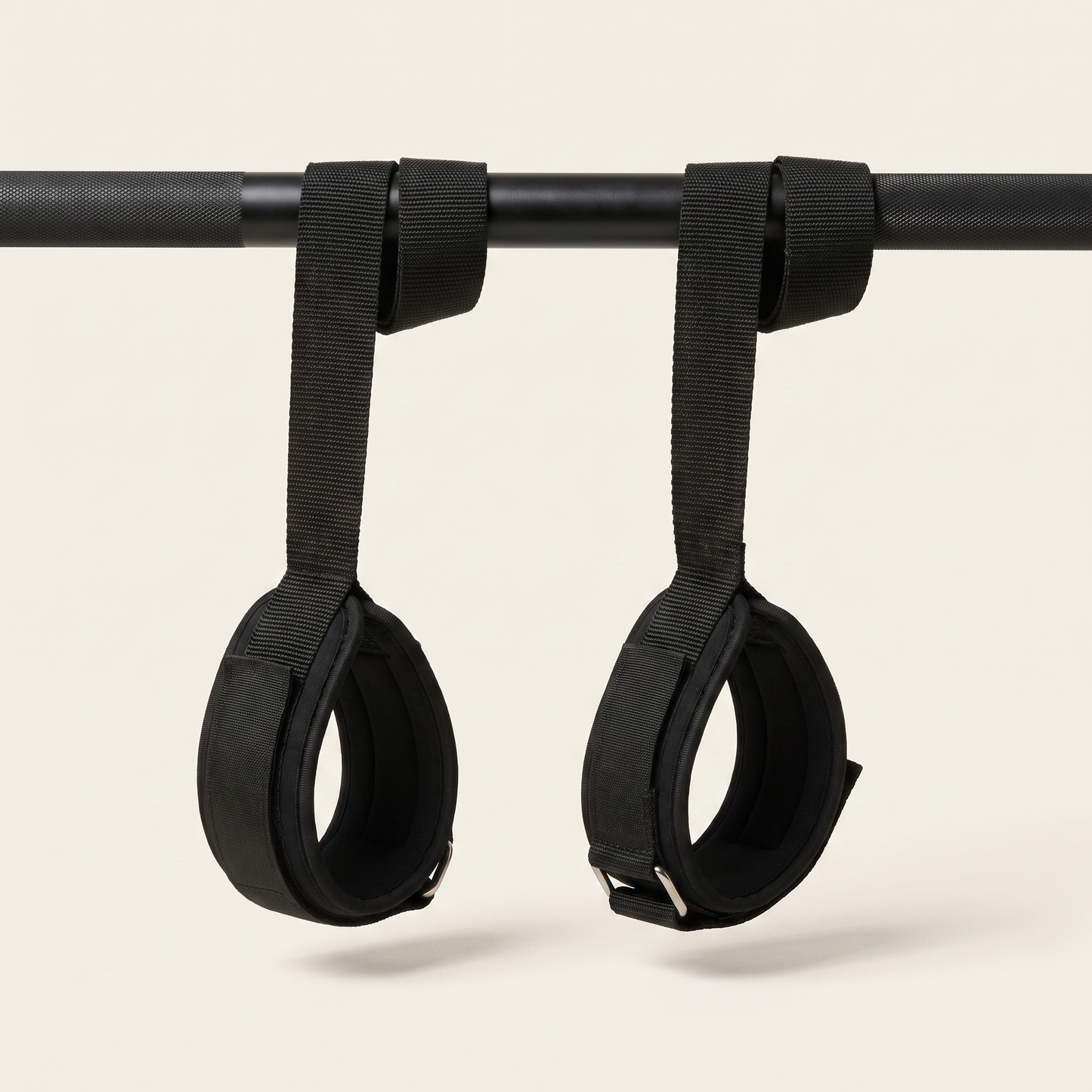 The Cuff pair hanging on a barbell