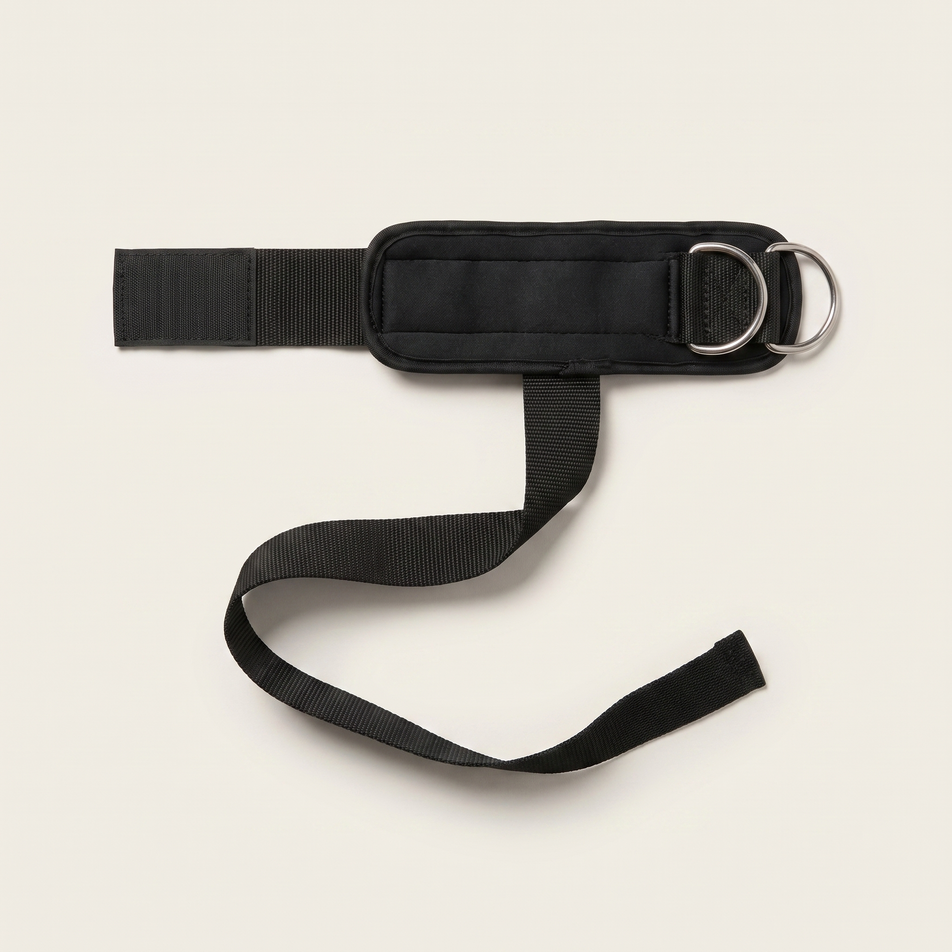 The Cuff — padded cuff, steel D-rings and strap detail