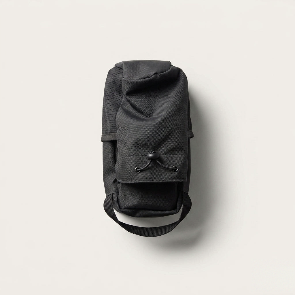 The Stash — top view, drawstring closure and carry handle