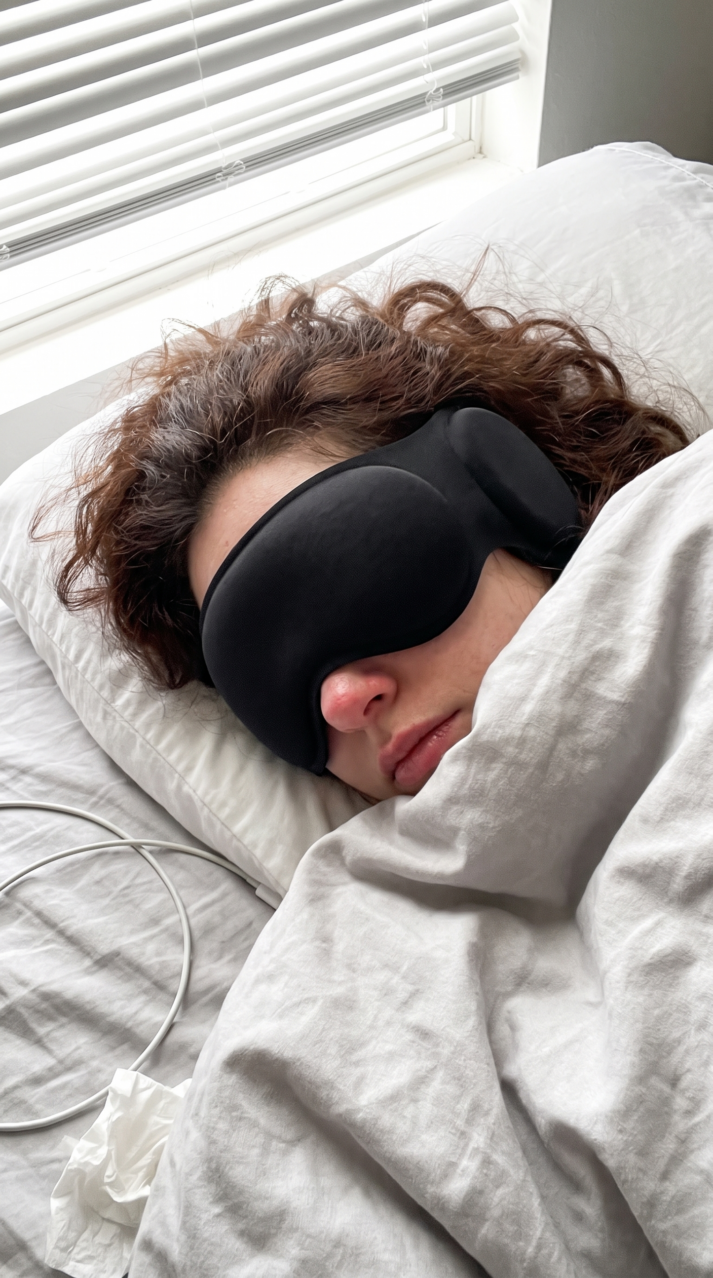 Cozy morning nap wearing The Blackout — total darkness, ears covered