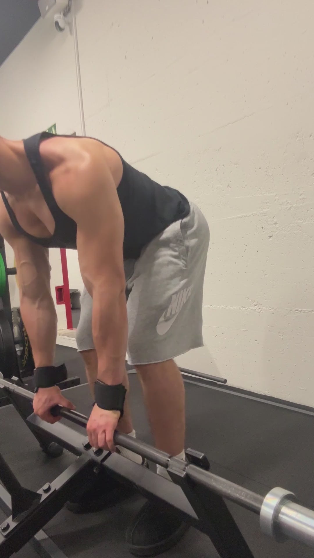 Strapping the Hook Grips onto the bar — real footage