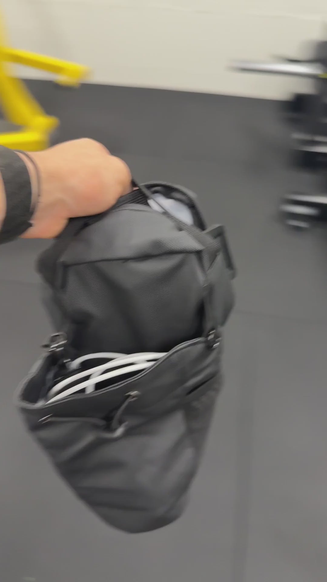 The Stash hung on a machine with gear inside, staying put hands-free
